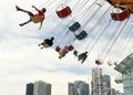 Chicago, Illinois, USA - June 06, 2018: People ride the Wave Swinger on Navy Pier in Chicago