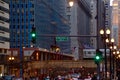 Elevated "el" train moving over Lake & LaSalle Streets in Chicago Loop during rush hour commute