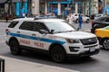 Chicago Police car parked at a bustling intersection in the downtown district of the city Royalty Free Stock Photo