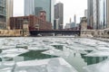 Chicago river downtown frozen ice buildings bridge Royalty Free Stock Photo