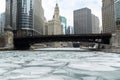 Chicago river downtown frozen ice buildings bridge Royalty Free Stock Photo