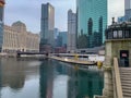 Chicago river surface reflection of skyscrapers, alongside bridgehouse Royalty Free Stock Photo