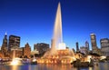 Chicago skyline illuminated at dusk with colorful Buckingham fountain on the foreground, Illinois Royalty Free Stock Photo