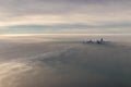 Chicago skyline popping up out of clouds in winter Royalty Free Stock Photo