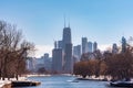 Chicago Skyline from the South Lagoon in Lincoln Park with Snow during Winter Royalty Free Stock Photo