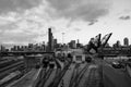 Chicago skyline with St. Charles Air Line Bridge. View from Amtrak Chicago Car Yard. Black and white. Royalty Free Stock Photo