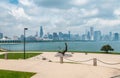 Chicago skyline and Sundial sculpture,  is named is Man Enters the Cosmos, located on the plaza of Adler Planetarium, Chicago, USA Royalty Free Stock Photo