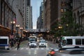 Chicago street bustling with life and cars commuting