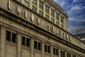 The Chicago Union Station building surrounded by office buildings with blue sky and clouds in downtown Chicago Illinois