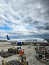 Chicago, USA - April 29, 2023: Boeing 787-300ER united airlines at airport with cargo loader