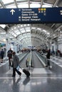 CHICAGO, USA - APRIL 15, 2014: Travelers walk to gates at Chicago O 'Hare International Airport in USA. It was the 5th busiest Royalty Free Stock Photo