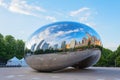 Chicago, USA - may 26, 2018: Reflection of city buildings on a metal surface of Cloud Gate also known as the Bean, Millennium Park Royalty Free Stock Photo