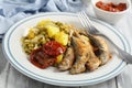 Chicharros fritos, traditional Portugal roasted horse mackerel, with vegetables Royalty Free Stock Photo