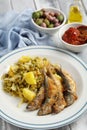 Chicharros fritos, traditional Portugal roasted horse mackerel, with vegetables Royalty Free Stock Photo