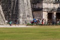 CHICHEN ITZA, MEXICO - FEB 26, 2016: Souvenir vendors arrive in the morning with their merchandise to the archeological