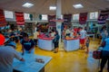 CHICHEN ITZA, MEXICO - NOVEMBER 12, 2017: Indoor view of unidentified people buying inside of a souvenir store