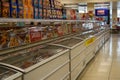 02/05/2020 Chichester, West sussex, UK An empty frozen food Aisle of a supermarket with freezers and products on shelves