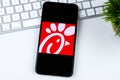 Chick-fil-A app logo on a smartphone screen.