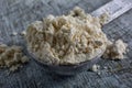 Chick pea flour closeup in measuring spoon Royalty Free Stock Photo