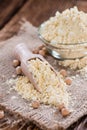 Chick Pea Flour on dark rustic background Royalty Free Stock Photo