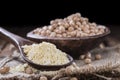 Chick Pea Flour on dark rustic background Royalty Free Stock Photo