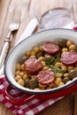 Chick pea with fried smoked sausages