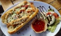 Chicked sandwich with salad and hot sauce Royalty Free Stock Photo