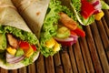 Chicken and avocado wrap sandwiches on mat Royalty Free Stock Photo