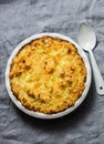 Chicken, bacon and leek cottage pie on a grey background Royalty Free Stock Photo