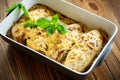 Chicken baked with cheese and spices