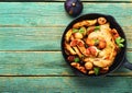 Chicken baked with potatoes and figs,space for text Royalty Free Stock Photo
