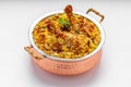 Chicken Biryani in brass serving bowl Royalty Free Stock Photo