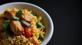 chicken biryani with chicken, onions, cashewnut paste, tomatoes,cup of basmoti rice Royalty Free Stock Photo