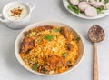 Chicken Biryani with Raita and Onion - One Pot Rice and Chicken Dish Royalty Free Stock Photo