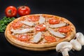 Chicken-blue pizza with tomato, mozzarella and Dor Blue cheeses