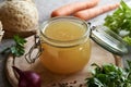 Bone broth made from chicken in a glass jar Royalty Free Stock Photo