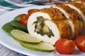 Chicken breast filled with spinach and cheese and fresh tomatoes Royalty Free Stock Photo