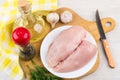Chicken breast fillet, pepper, vegetable oil and garlic Royalty Free Stock Photo