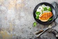 Chicken breast or fillet, poultry meat grilled and boiled white rice with green peas and fresh spinach leaves Royalty Free Stock Photo