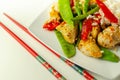 Chicken breast pieces in a Thai red curry sauce made with coconut cream, red chillies, lemongrass, lime leaf, with fragrant rice, Royalty Free Stock Photo