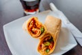 Chicken breast with piri piri sauce and lettuce in a chili tortilla wrap Royalty Free Stock Photo