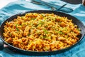 Chicken Breast with Rice and vegetables in a frying pan Royalty Free Stock Photo