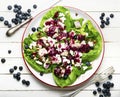 Chicken breast salad, greens, blueberries