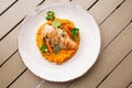 Chicken breast steak with carrot puree baby carrot and broccoli. Grilled chicken slice with baby carrot puree. wooden Royalty Free Stock Photo
