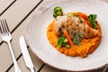 Chicken breast steak with carrot puree baby carrot and broccoli. Grilled chicken slice with baby carrot puree. wooden Royalty Free Stock Photo