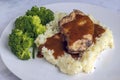 chicken breast top with gravy on mash potatoes Royalty Free Stock Photo