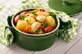 Chicken breasts stewed with vegetables potatoes, carrots, peas, tomatoes and peppers. Royalty Free Stock Photo