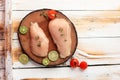 Chicken Breat Fillet on Wooden Chopping Board Royalty Free Stock Photo