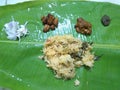 Chicken briyani, chicken gravy, chicken fry, raita, Pudina chutney served in traditional banana leaf