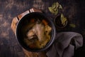 Chicken broth soup or bouillon in pan Royalty Free Stock Photo